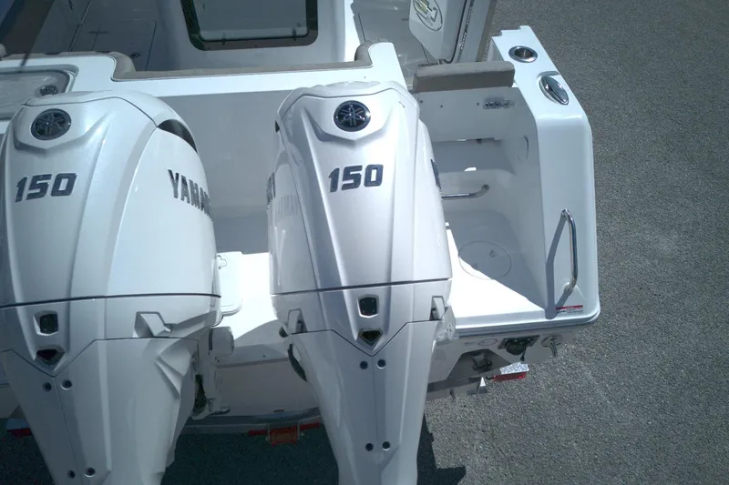 Slide: The Image of 2026 Sea Hunt Gamefish 25 with dual Yamaha 150 outboard engines. - 3