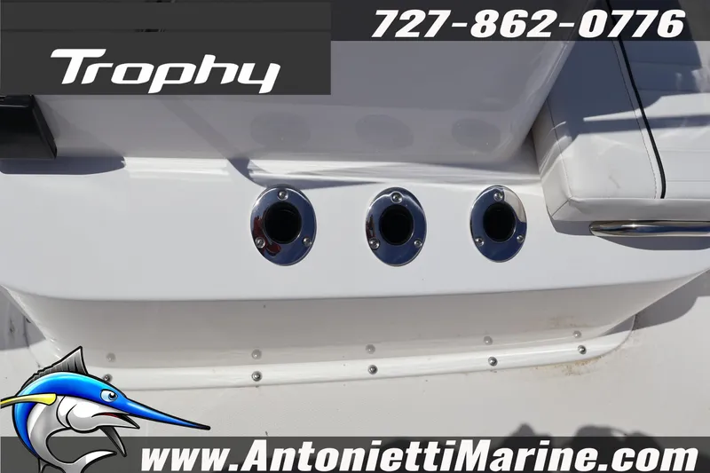Slide: The Image of 2026 Bayliner Trophy T18 boat detail with logo and contact information. - 11