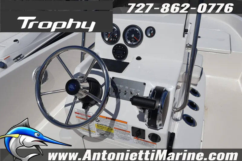 Slide: The Image of Steering console of 2026 Bayliner Trophy T18 boat with gauges and controls. - 7