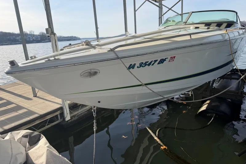 Slide: The Image of 2001 Formula 312 FASTech boat docked on a sunny day by the lake. - 10