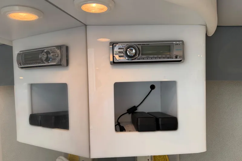 Slide: The Image of 2001 Formula 312 FASTech interior with stereo system and storage compartments. - 32