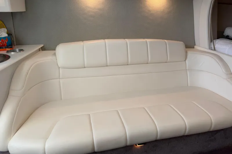 Slide: The Image of Luxurious white leather seating in 2001 Formula 312 FASTech boat interior. - 35