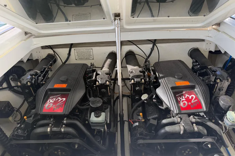 Slide: The Image of 2001 Formula 312 FASTech boat engine compartment with twin MerCruiser 6.2 MPI engines. - 38