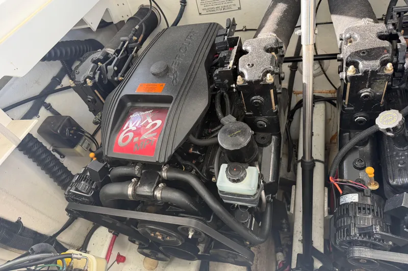Slide: The Image of Engine compartment of a 2001 Formula 312 FASTech boat, featuring a MerCruiser 6.2 MPI engine. - 41