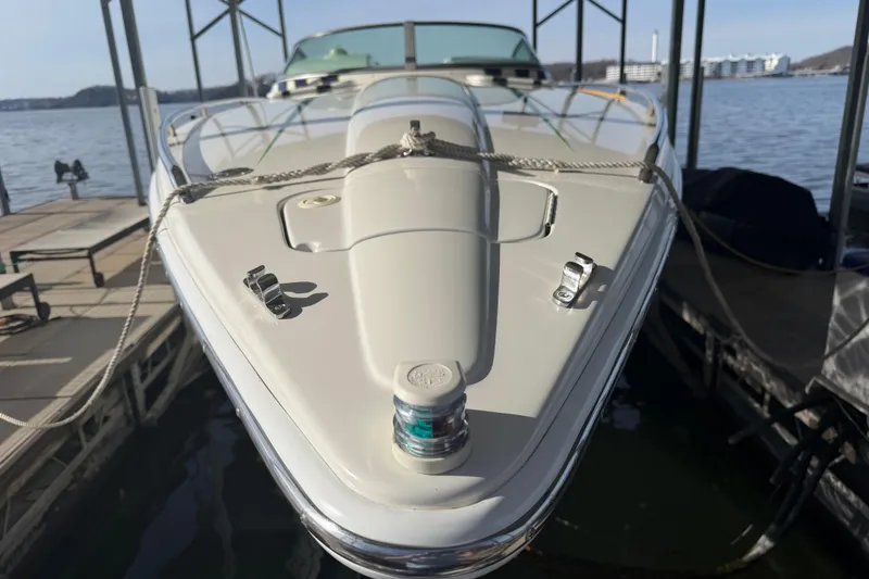 Slide: The Image of 2001 Formula 312 FASTech boat docked, showcasing sleek design and polished finish. - 8