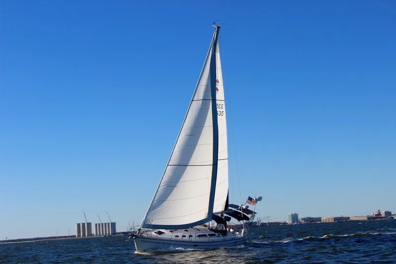 The Image of Sailing yacht Catalina 400 MkII 2006 on open water under clear blue sky. - 0