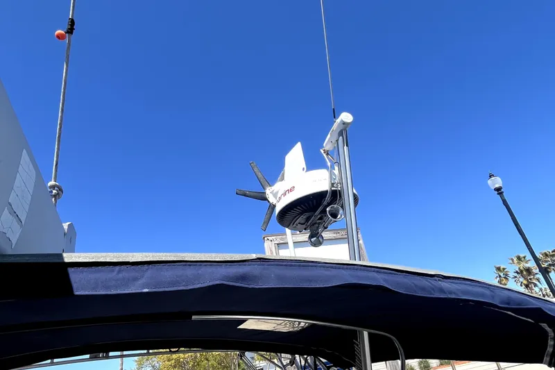 Slide: The Image of Catalina 400 MkII 2006 sailboat with radar and antenna against clear blue sky. - 10
