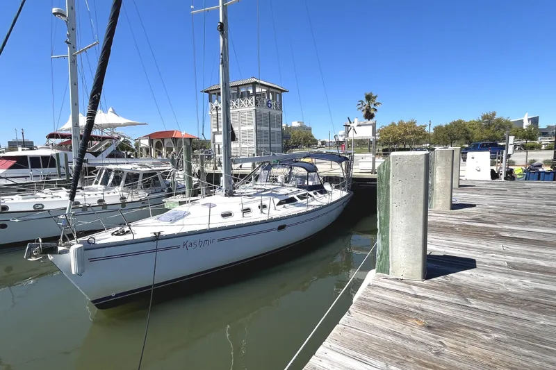 Slide: The Image of Catalina 400 MkII 2006 sailboat docked at marina under clear blue sky. - 2
