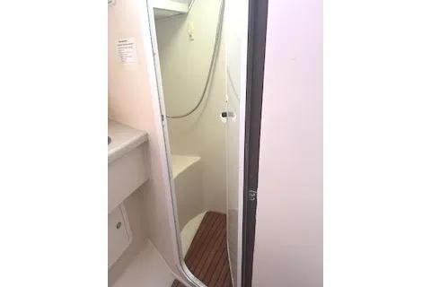 Slide: The Image of 2006 Catalina 400 MkII yacht bathroom with shower and wooden floor. - 34