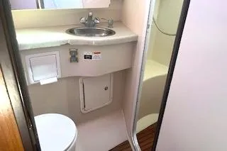 Slide: The Image of 2006 Catalina 400 MkII yacht bathroom with sink, toilet, and shower. - 35