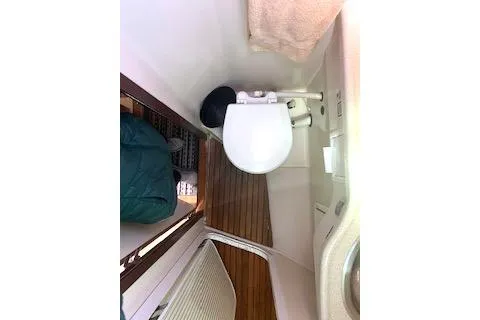 Slide: The Image of 2006 Catalina 400 MkII yacht bathroom with wooden flooring and compact toilet. - 36