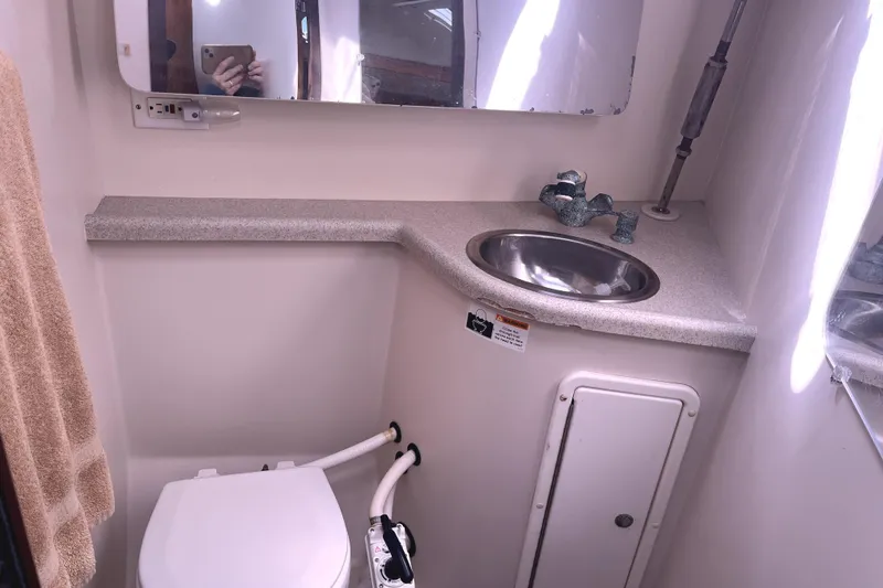 Slide: The Image of Bathroom interior of 2006 Catalina 400 MkII yacht with sink and toilet. - 44
