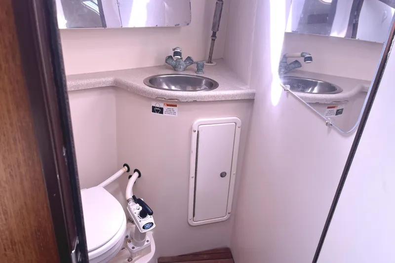 Slide: The Image of 2006 Catalina 400 MkII yacht bathroom with sink, mirror, and marine toilet. - 45