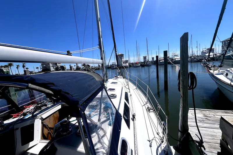 Slide: The Image of Catalina 400 MkII sailboat docked at marina, clear blue sky, 2006 model. - 8