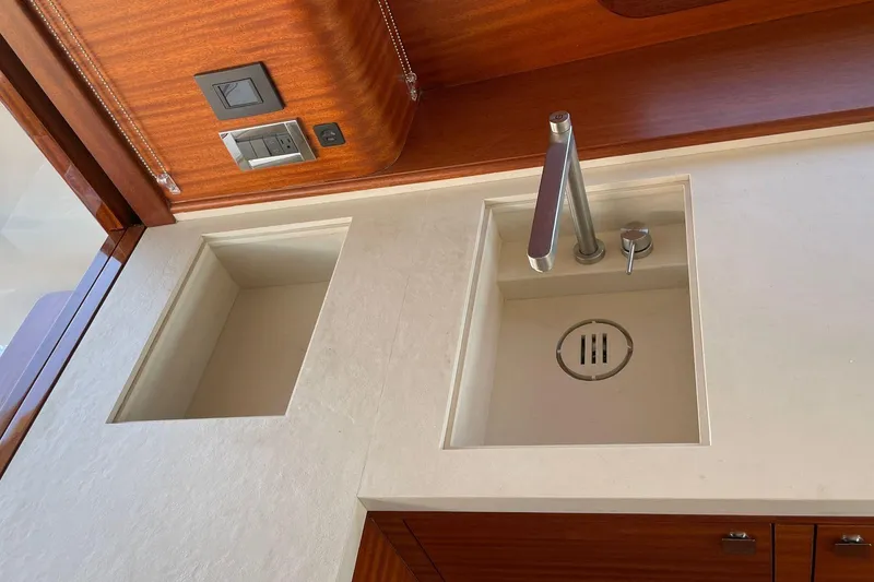 Slide: The Image of Modern kitchen sink area on 2027 Vicem 62 Flybridge yacht with sleek faucet design. - 8