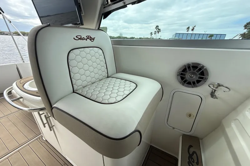 Slide: The Image of Luxurious seating on a 1995 Sea Ray Sundancer 370 yacht with elegant design details. - 15