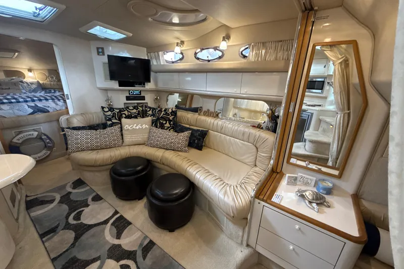 Slide: The Image of Luxurious interior of a 1995 Sea Ray Sundancer 370 yacht with plush seating and modern amenities. - 24