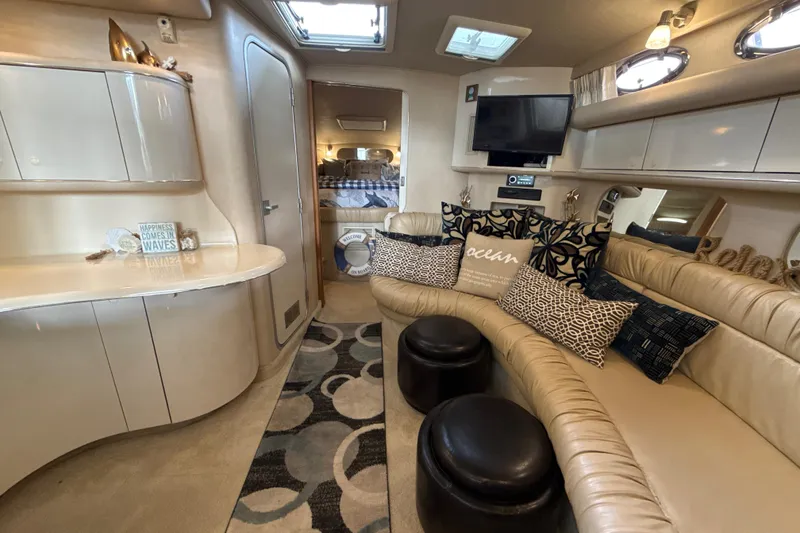 Slide: The Image of Luxurious interior of a 1995 Sea Ray Sundancer 370 yacht with plush seating and decor. - 27