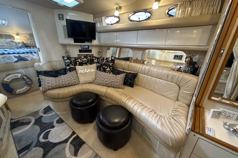 Slide: The Image of Luxurious interior of 1995 Sea Ray Sundancer 370 yacht with plush seating and modern decor. - 34