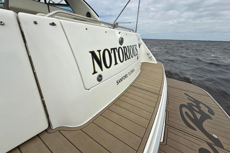 Slide: The Image of 1995 Sea Ray Sundancer 370 boat named "Notorious" on water, Sanford, Florida. - 52