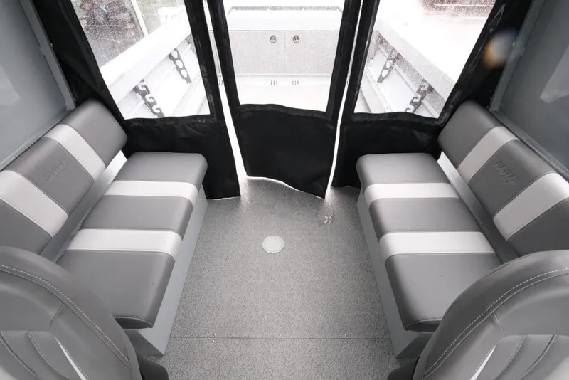 Slide: The Image of Interior of 2026 Hewescraft 200 ProV boat with gray seating and spacious layout. - 16
