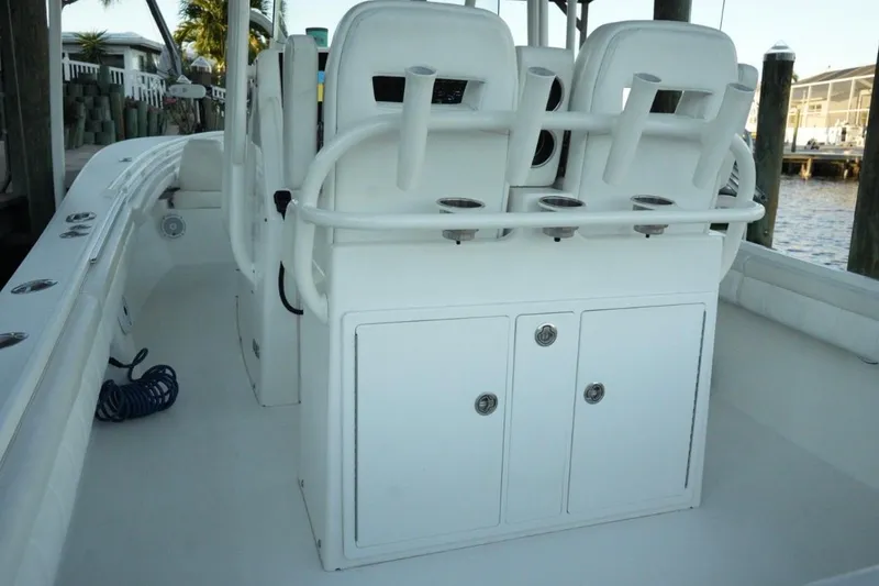 Slide: The Image of 2018 Regulator 28 boat interior with seating and storage compartments. - 5