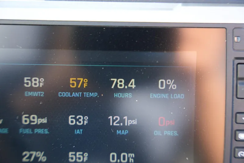 Slide: The Image of Dashboard display of a 2023 Axis A20 showing engine metrics and temperatures. - 13