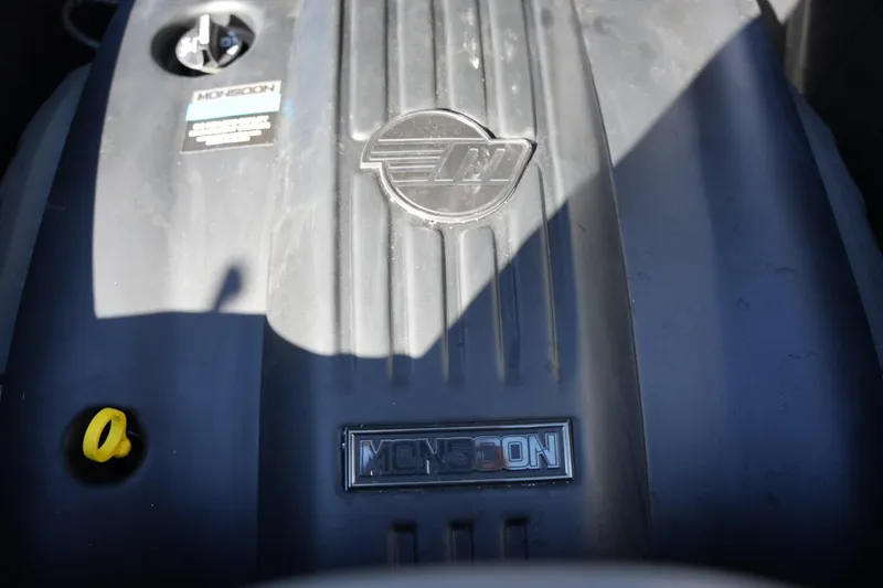 Slide: The Image of 2023 Axis A20 engine cover with Monsoon branding and logo. - 18