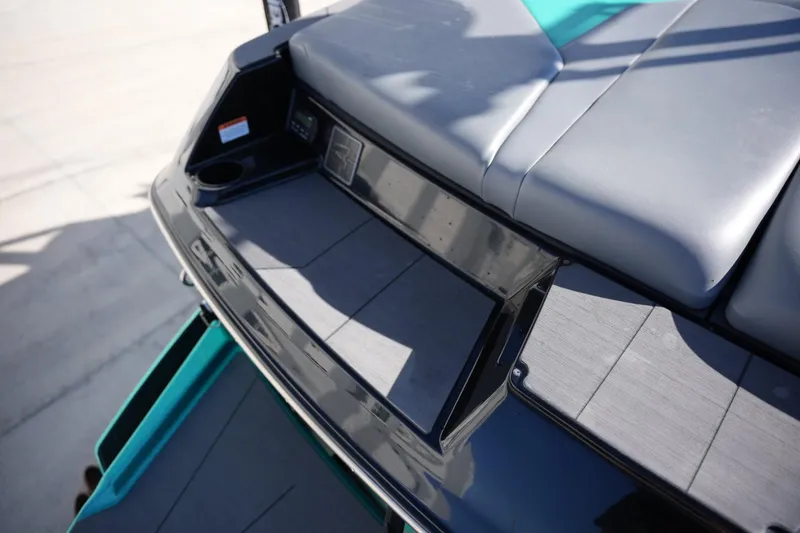 Slide: The Image of 2023 Axis A20 boat rear seating and deck area, featuring sleek design and modern materials. - 21