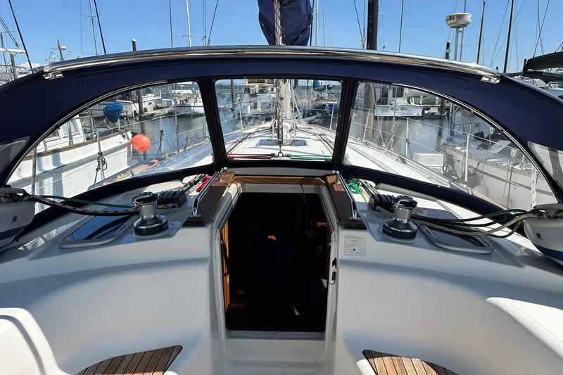 Slide: The Image of Cockpit view of 2003 Bavaria 44 sailboat docked at marina. - 13
