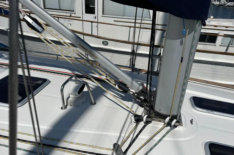 Slide: The Image of Deck of 2003 Bavaria 44 sailboat with rigging and mast details. - 6