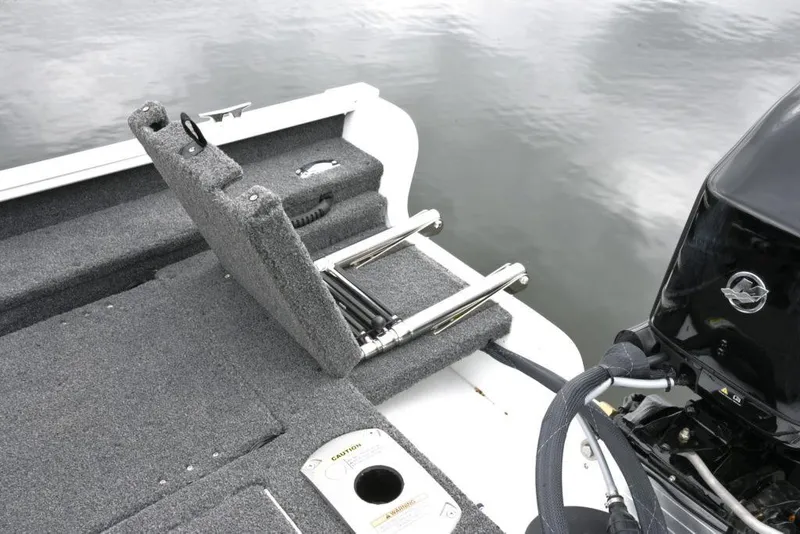 Slide: The Image of Manufacturer Provided Image: 2022 Lund 1675 Adventure Sport boat with foldable ladder and Mercury outboard motor. - 25