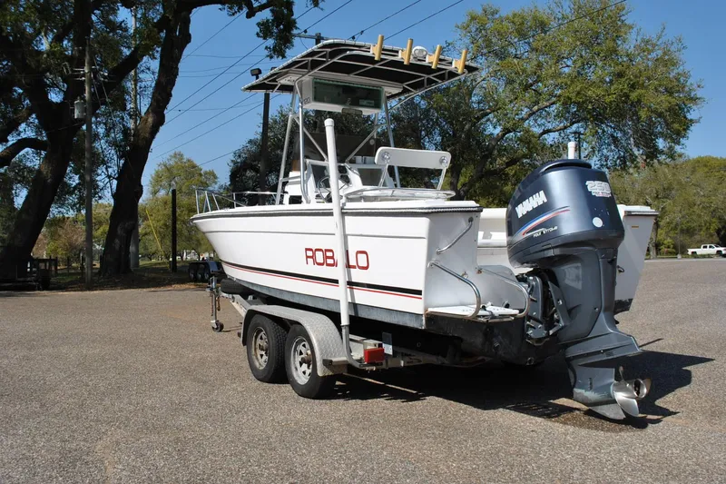 Slide: The Image of 1993 Robalo 2120 Center Console boat on trailer with Yamaha outboard motor. - 12