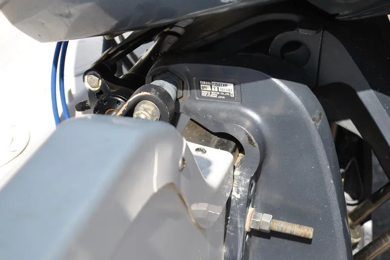Slide: The Image of Close-up of a Yamaha F250TXR engine part on a 1993 Robalo 2120 Center Console boat. - 26