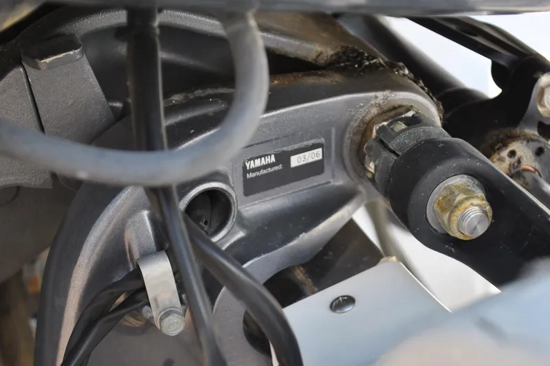 Slide: The Image of Close-up of Yamaha engine part on 1993 Robalo 2120 Center Console boat. - 27