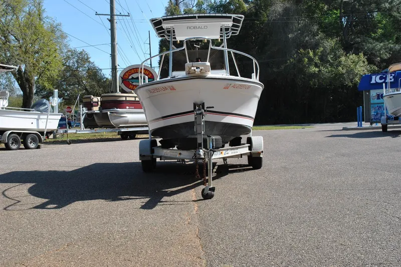 Slide: The Image of 1993 Robalo 2120 Center Console boat on trailer in parking lot. - 3
