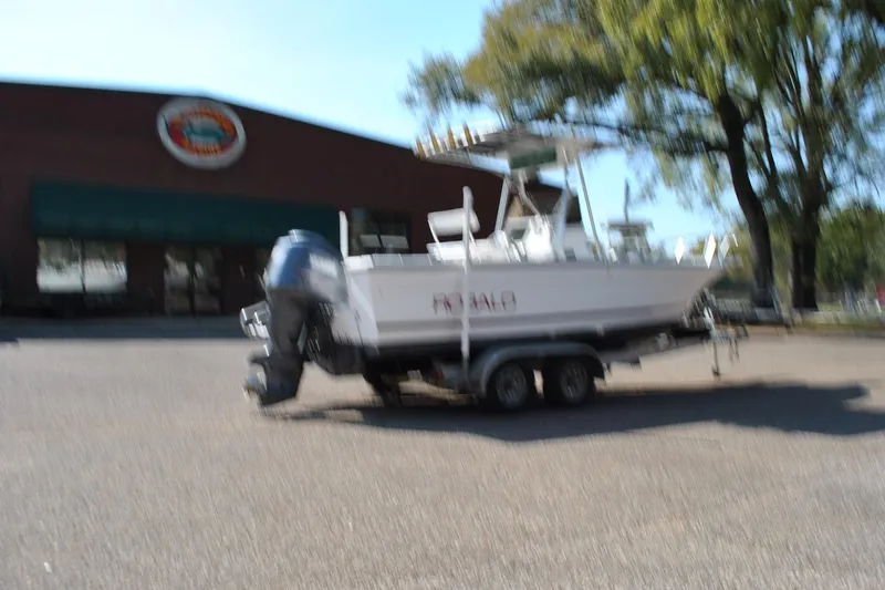 Slide: The Image of Blurry image of a 1993 Robalo 2120 Center Console boat on a trailer. - 9