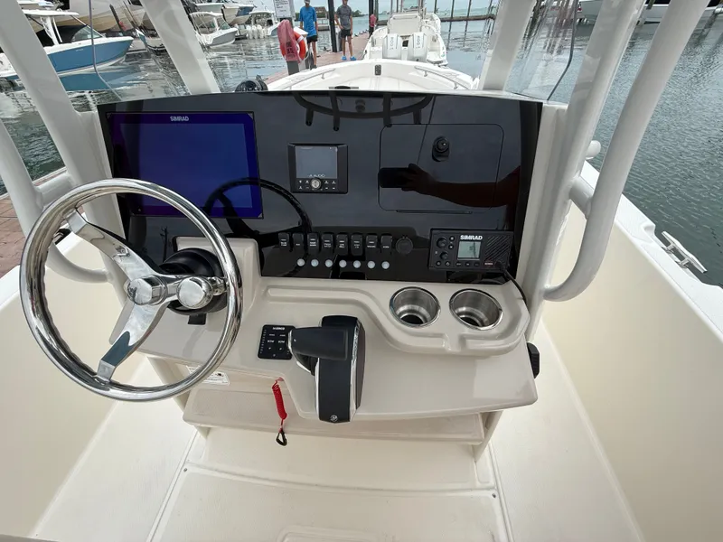 Slide: The Image of Boston Whaler 250 Dauntless 2026 helm with modern electronics. - 14