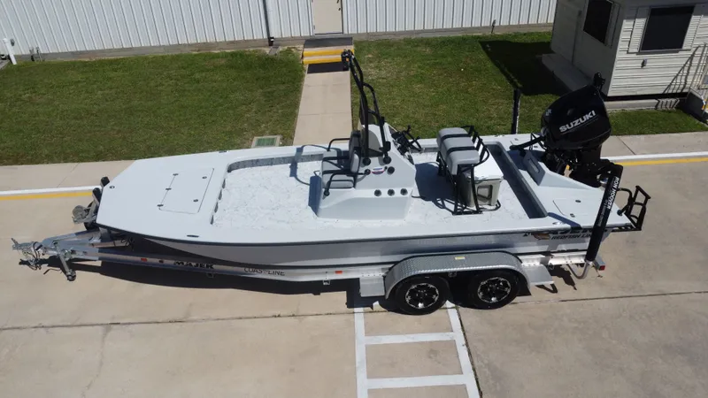 Slide: The Image of 2024 Majek 21RFL boat on trailer, Suzuki engine. - 12