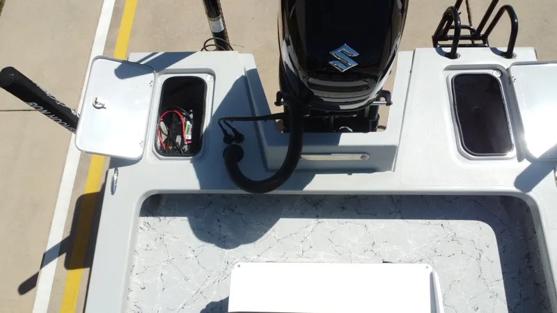 Slide: The Image of 2024 Majek 21RFL boat with Suzuki outboard motor. - 32