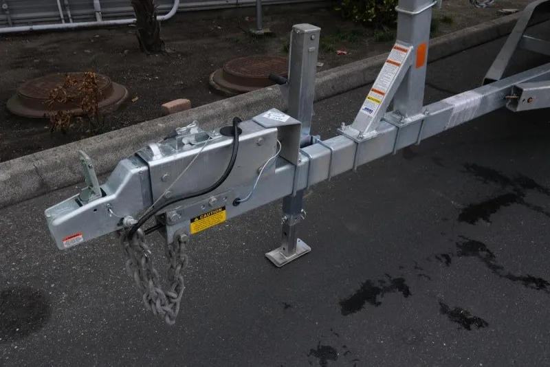 Slide: The Image of Trailer hitch of a 2026 Hewescraft 240 Ocean Pro ET Hardtop on asphalt. - 18