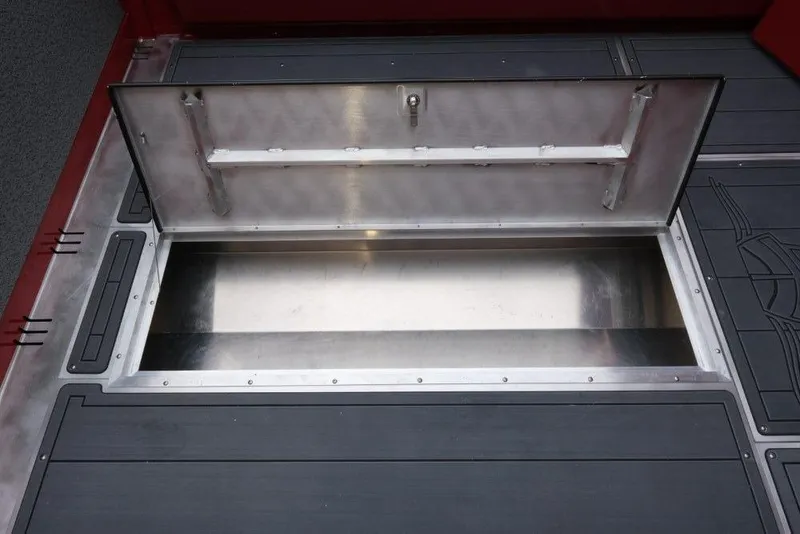 Slide: The Image of Open storage compartment on 2026 Hewescraft 240 Ocean Pro ET Hardtop boat. - 20