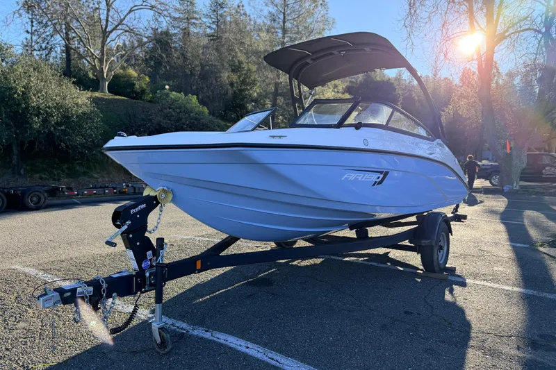 Slide: The Image of 2025 Yamaha Boats AR190 on trailer in sunny outdoor setting. - 20
