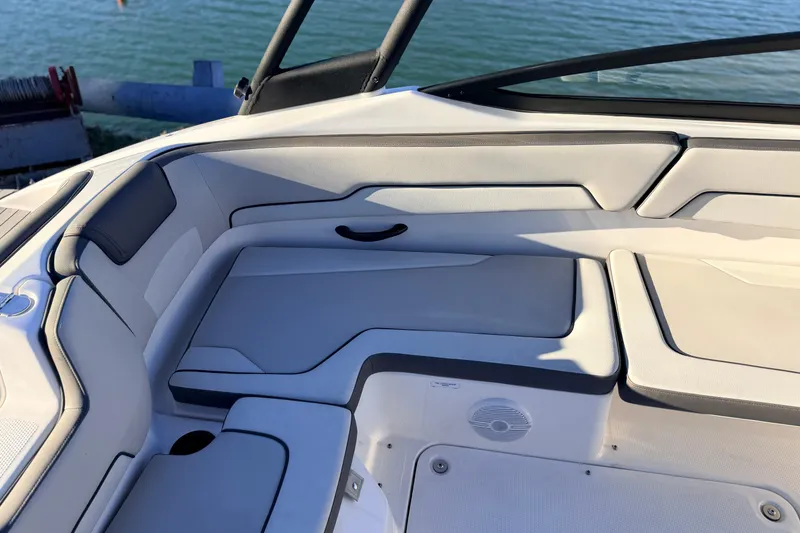 Slide: The Image of 2025 Yamaha Boats AR190 interior seating with sleek design and comfortable upholstery. - 29