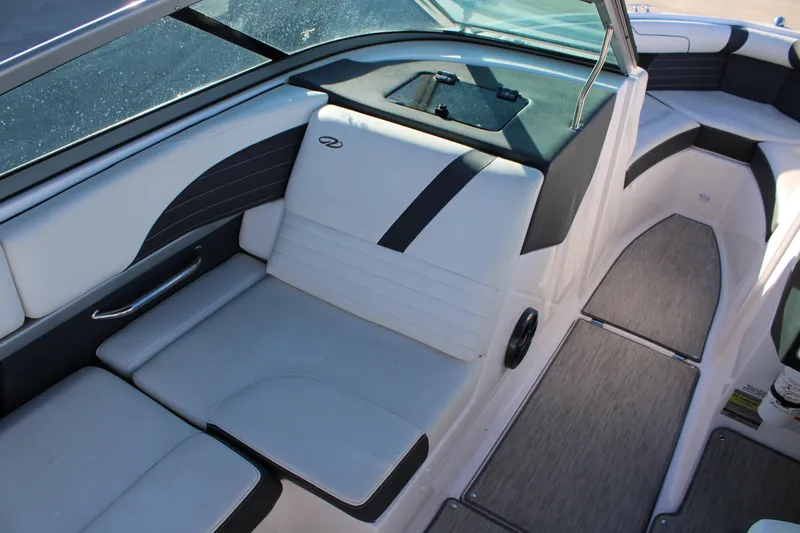 Slide: The Image of 2017 Regal 2100 Bowrider interior with sleek seating and modern design. - 10