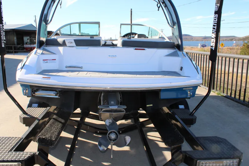 Slide: The Image of 2017 Regal 2100 Bowrider on trailer, rear view showing propeller and swim platform. - 5