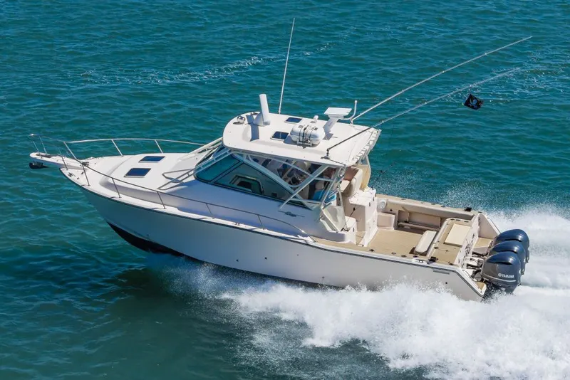 Slide: The Image of 2014 Grady-White Express 370 boat cruising on the sea. - 3