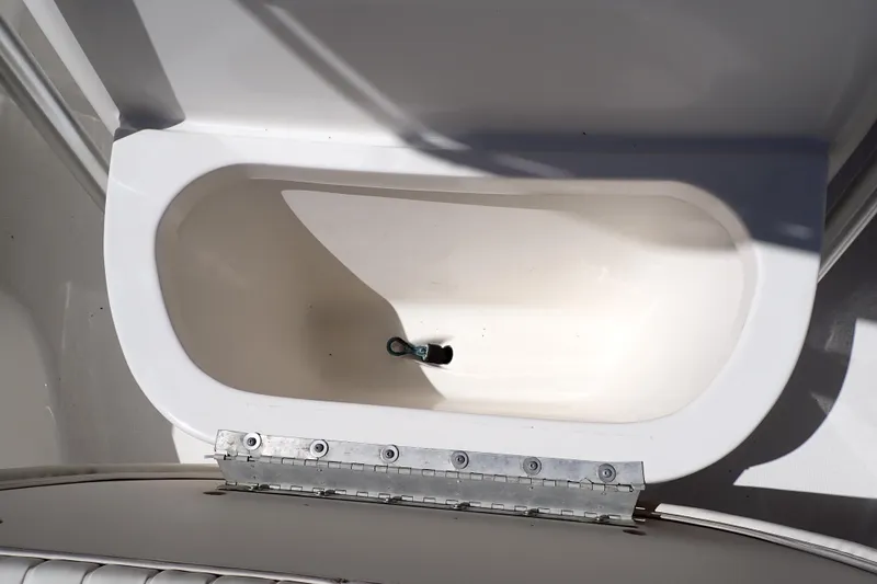 Slide: The Image of Livewell compartment on a 2006 Robalo R220 Center Console boat. - 29