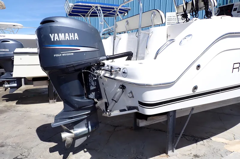 Slide: The Image of 2006 Robalo R220 Center Console with Yamaha four-stroke outboard motor. - 54