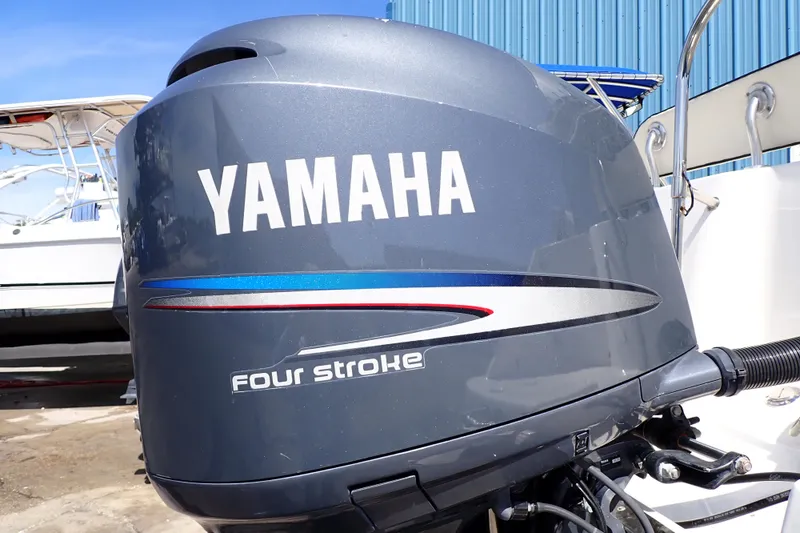 Slide: The Image of Yamaha four-stroke outboard motor on 2006 Robalo R220 Center Console boat. - 55